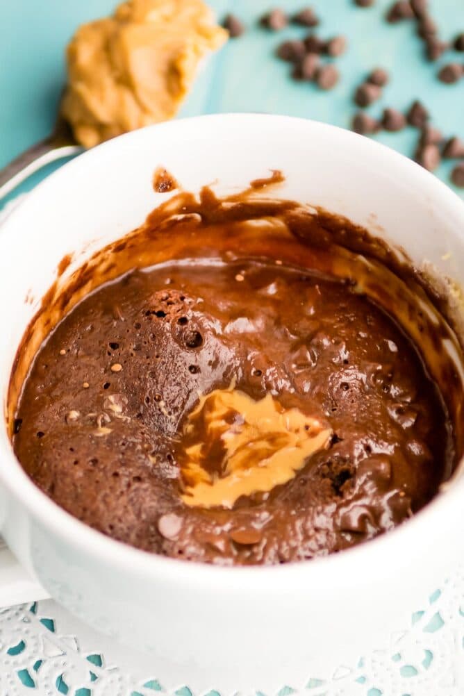 chocolate cookie in a mug with peanut butter