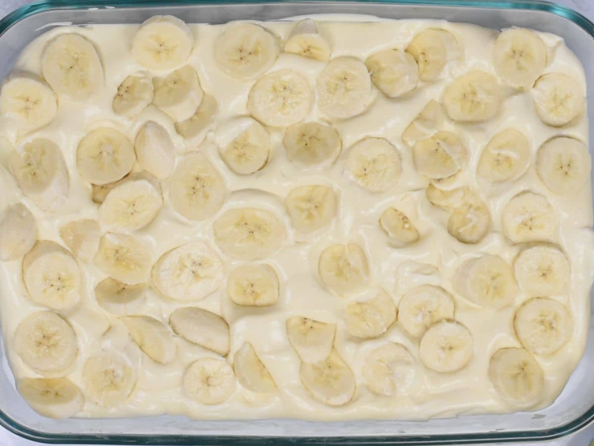 pudding and bananas in pan.