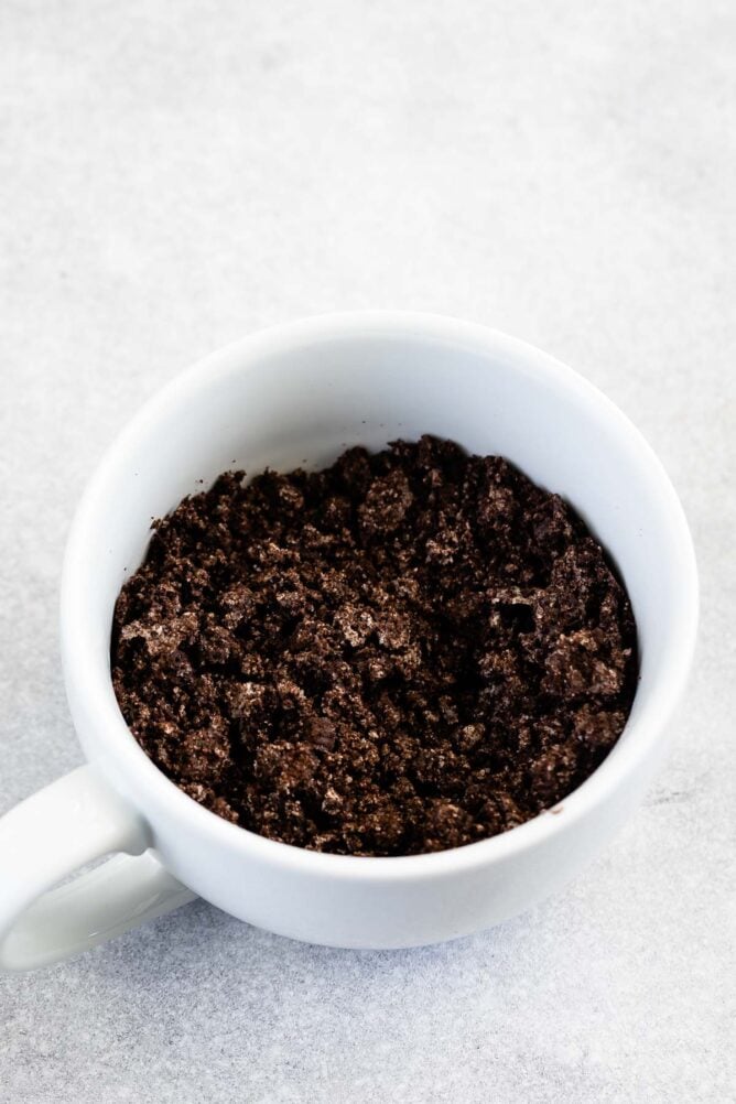 Overhead shot of crushed up Oreos in a mug