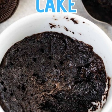 Overhead shot of Oreo mug cake with recipe title on top of image