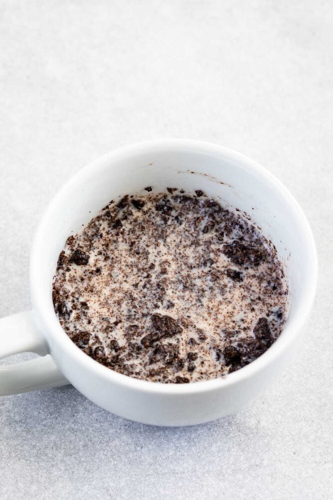 Overhead shot of oreos and milk in a mug