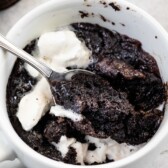 Overhead shot of Oreo mug cake with ice cream on top