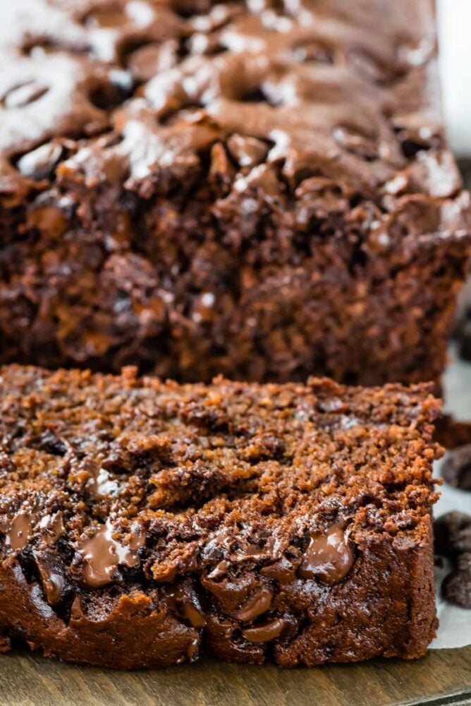 Close up of triple chocolate banana bread with end slice cut off