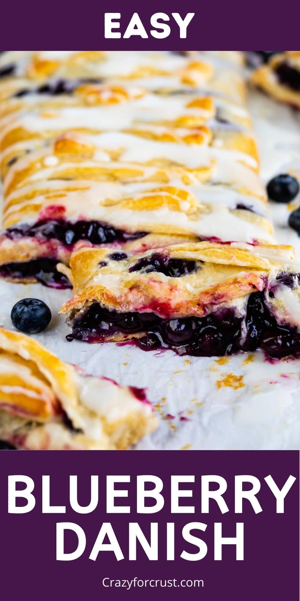 Blueberry danish with slices cut off and recipe title on the bottom of photo