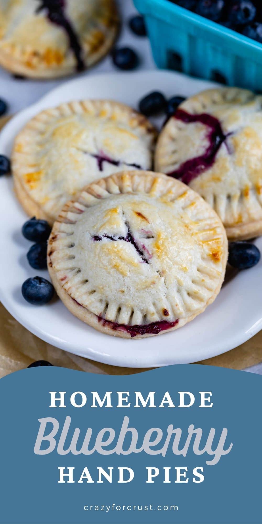 Three blueberry hand pies on a plate with recipe title on bottom of photo