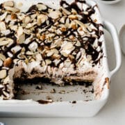 mocha mud pie in pan with slices missing