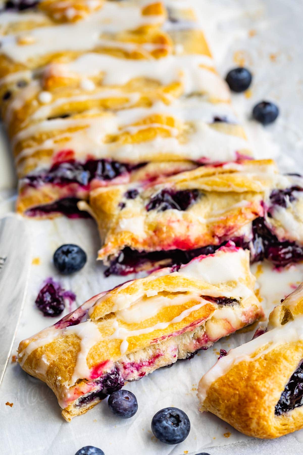 Overhead view of easy blueberry danish with pieces cut