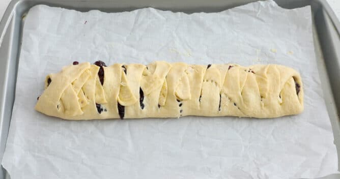 blueberry danish unbaked on cookie sheet