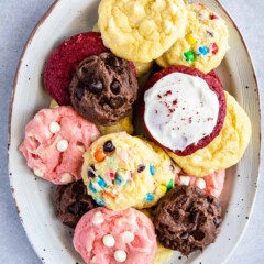 Overhead shot of a bunch of different cake mix cookies on a serving plate