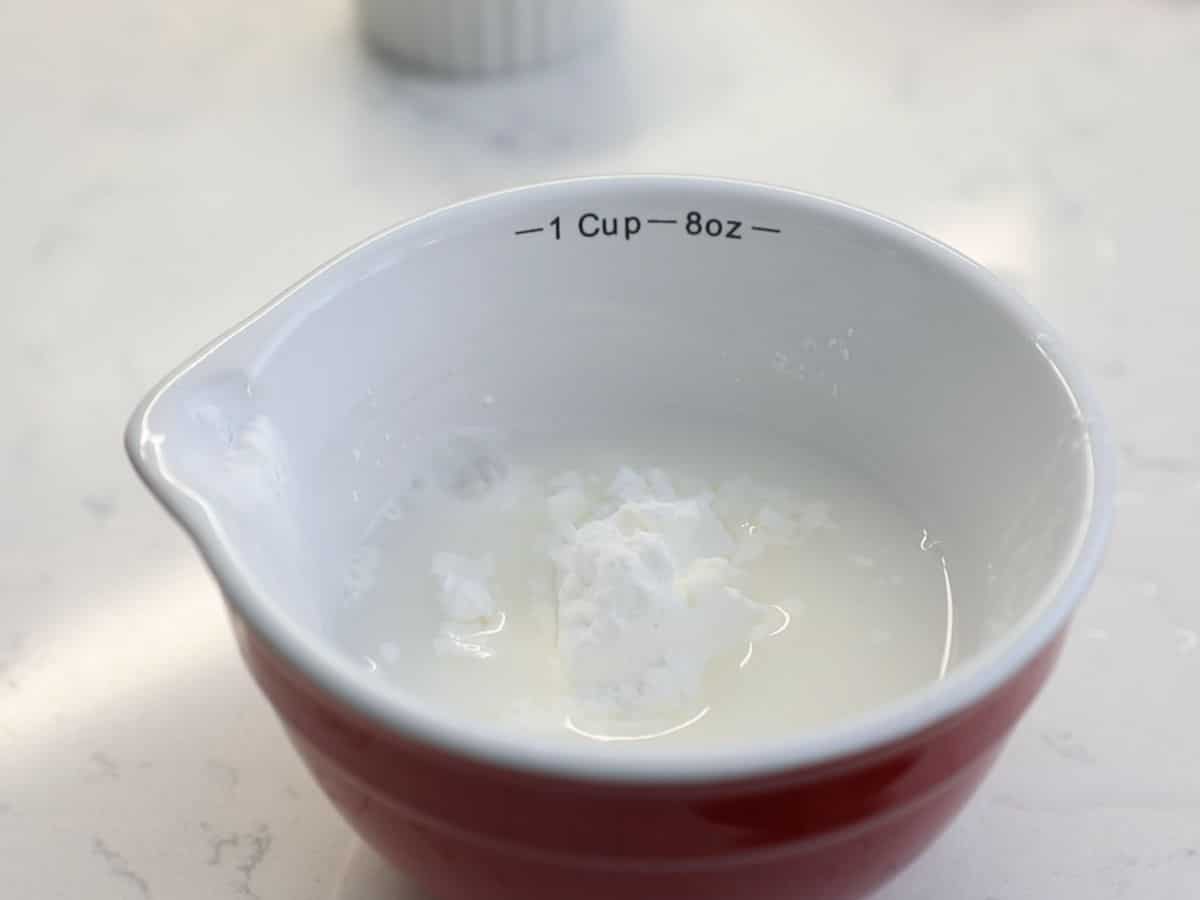 cornstarch and water in measuring cup.