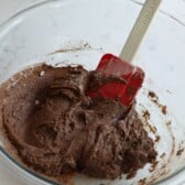 cookie batter in large bowl with spatula.