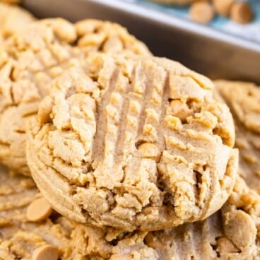 Close up shot of XL bakery style peanut butter cookies on a sheet pan