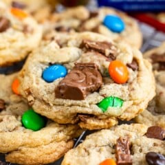 Close up shot of candy bar cookies on a metal cooling rack