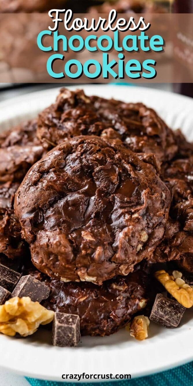 Close up shot of flourless brownie cookies with top cookie split in half with recipe title on top of image