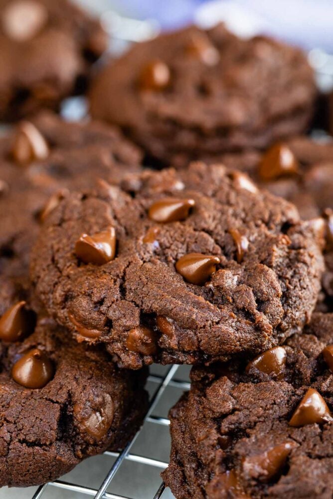 Fudgy Brownie Cookies with chocolate chips on a wire cooling rack