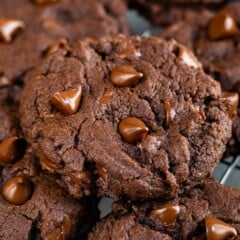 Fudgy Brownie Cookies with chocolate chips on a wire cooling rack