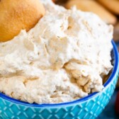 pumpkin fluff in blue bowl with cookie and words on photo