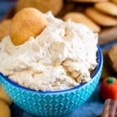 pumpkin fluff in blue bowl with vanilla wafer