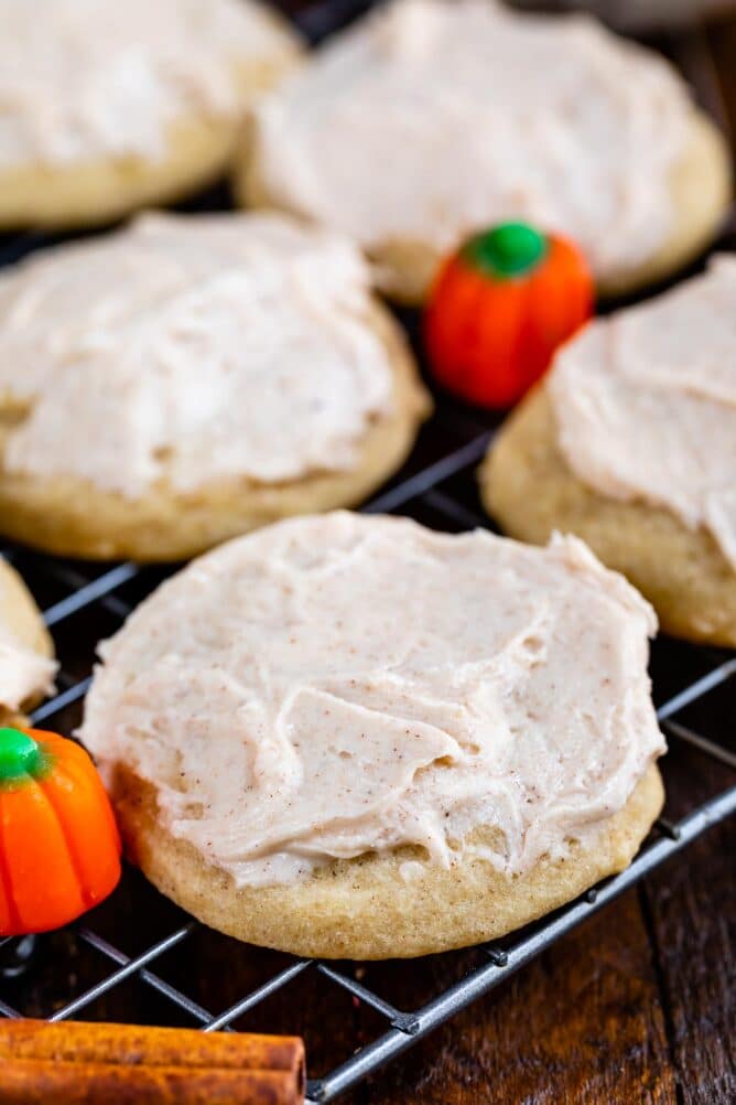 pumpkin spice cookie with frosting on rack