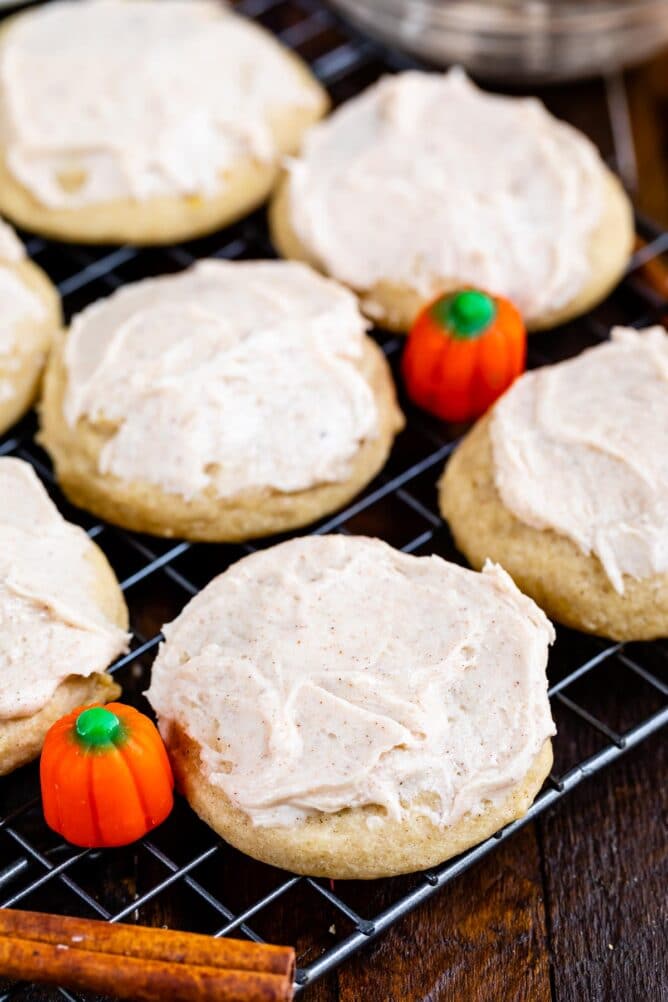 pumpkin spice cookie with frosting on rack