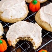 pumpkin spice cookie with frosting on rack