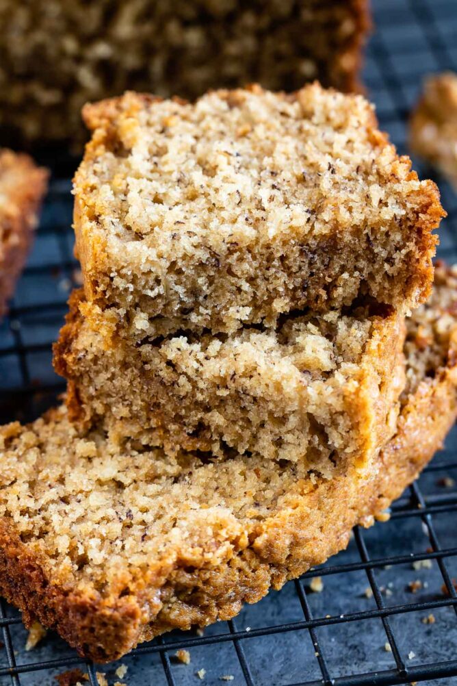 Stack of peanut butter banana bread on wire cooling rack