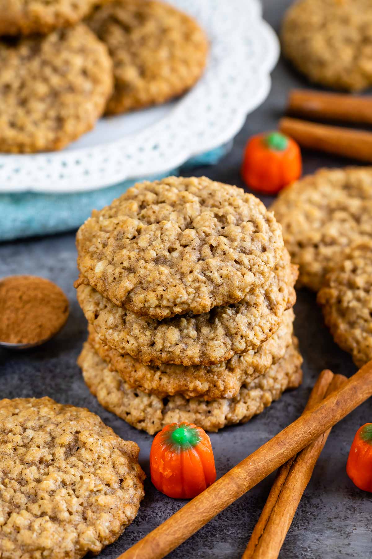 Pumpkin spice oatmeal cookies with cinnamon sticks and pumpkin candies