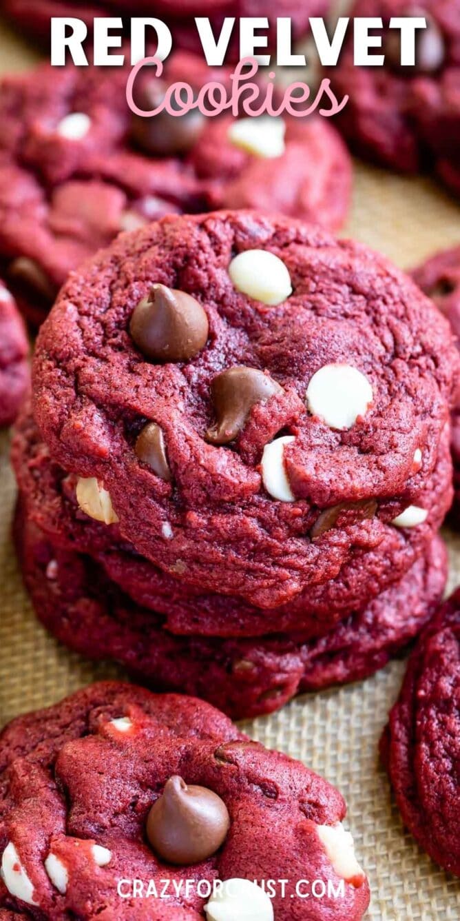Stack of red velvet cookies with more cookies around it and recipe title on top of image