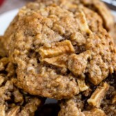 Group of apple oatmeal cookies with recipe title on top of image