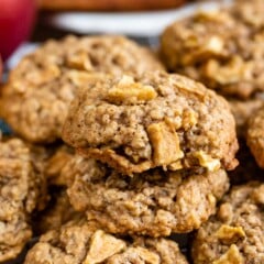 Group of apple oatmeal cookies on a metal cooking rack