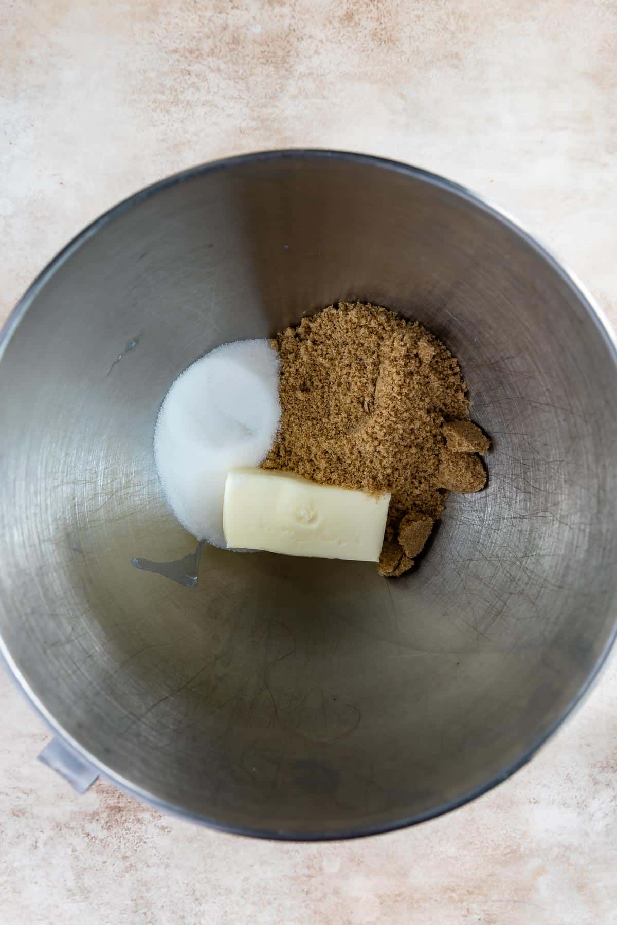 butter and sugars in the bowl of a stand mixer.