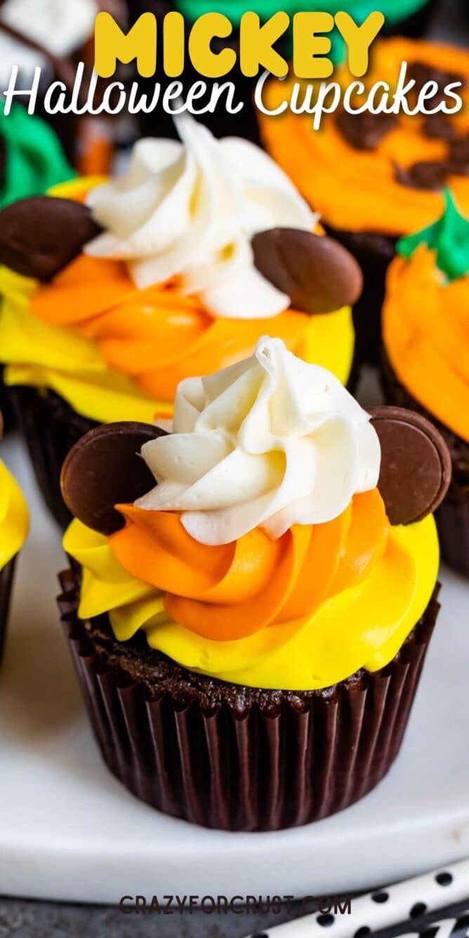 Close up shot of halloween themed mickey mouse cupcake with recipe title in the top of photo
