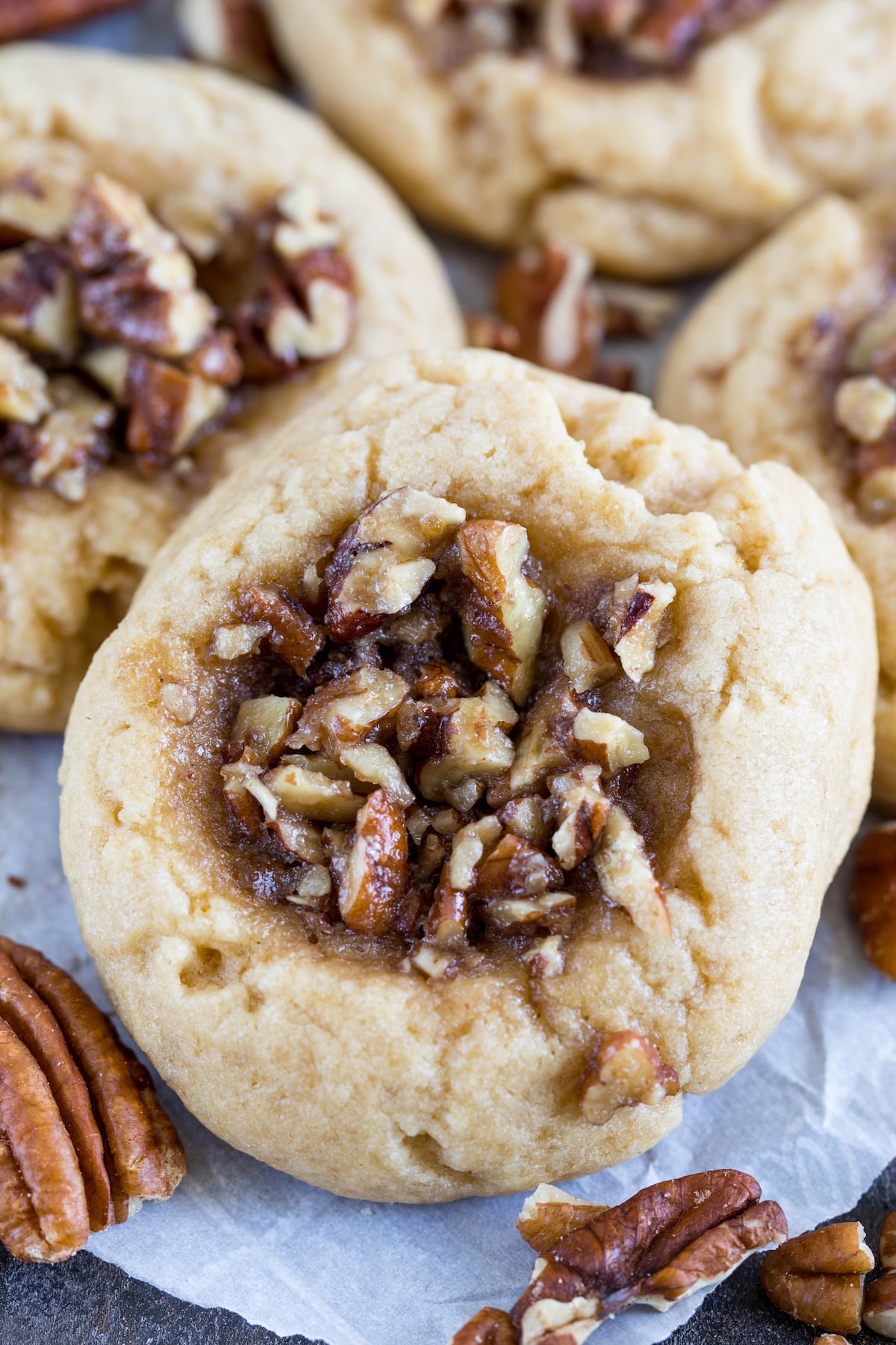 pecan pie cookies close up on parchment.