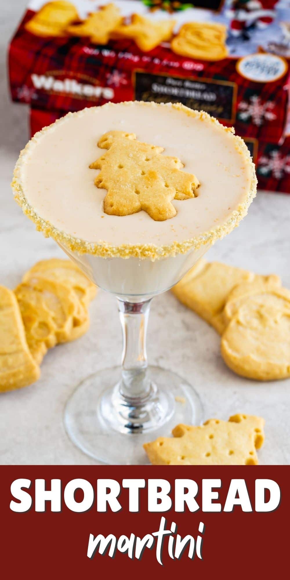 martini in glass with floating shortbread cookie