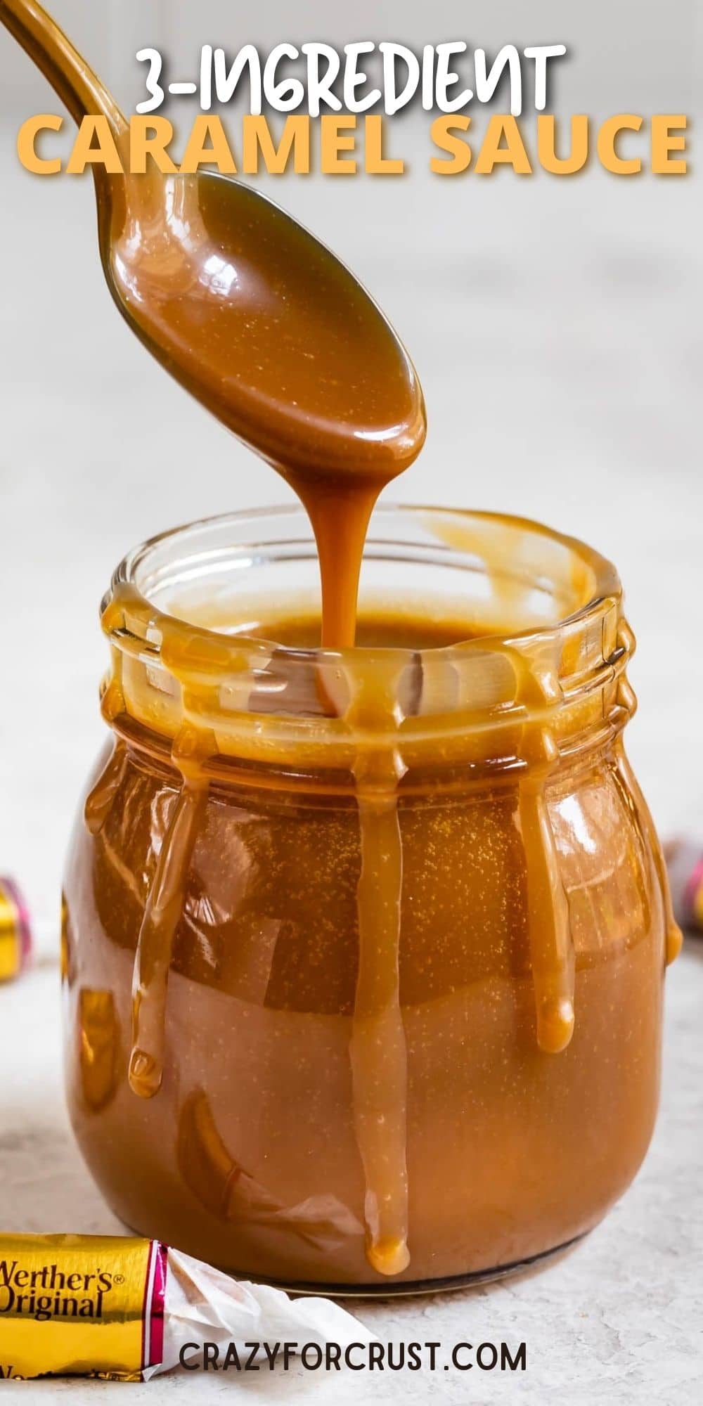Spoonful of three-ingredient caramel sauce being poured back into the small jar with recipe title on top of image