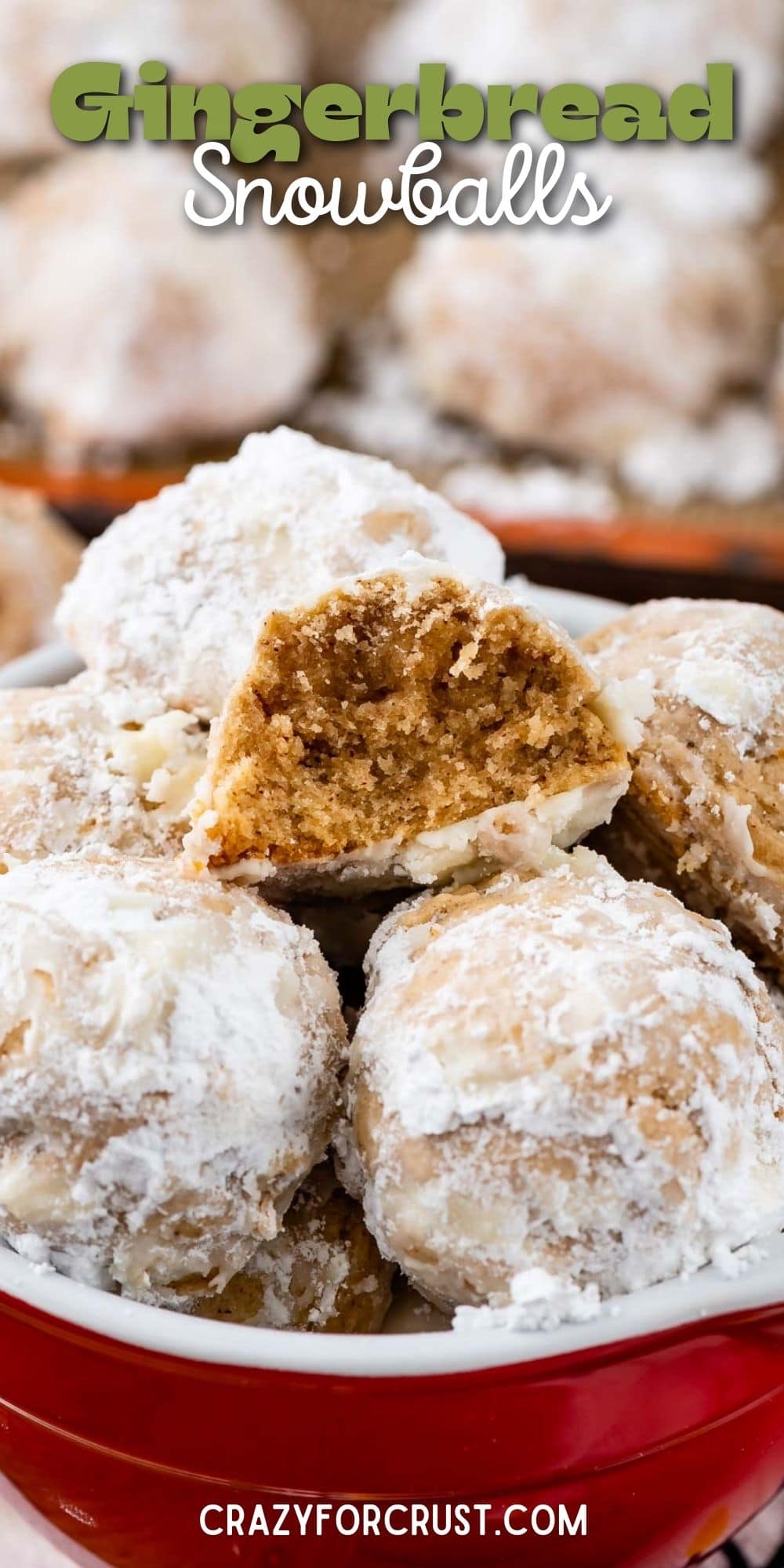 Close up shot of bowl of gingerbread snowball cookies with one split in half to show inside of cookie with recipe title on top of image