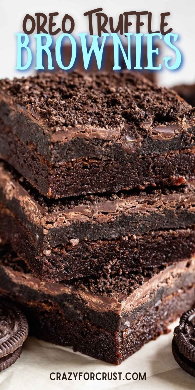 Stack of three Oreo truffle brownies with Oreos around them and recipe title on top of image