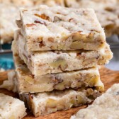 Stack of pecan shortbread cookies with more in background