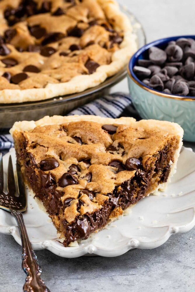 slice of chocolate chip cookie pie on white plate