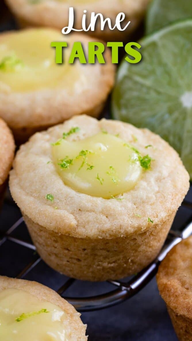 Close up of mini lime tarts with the recipe title on top of image