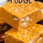 Salted butterscotch fudge stacked on top of eachother with recipe title on top of image