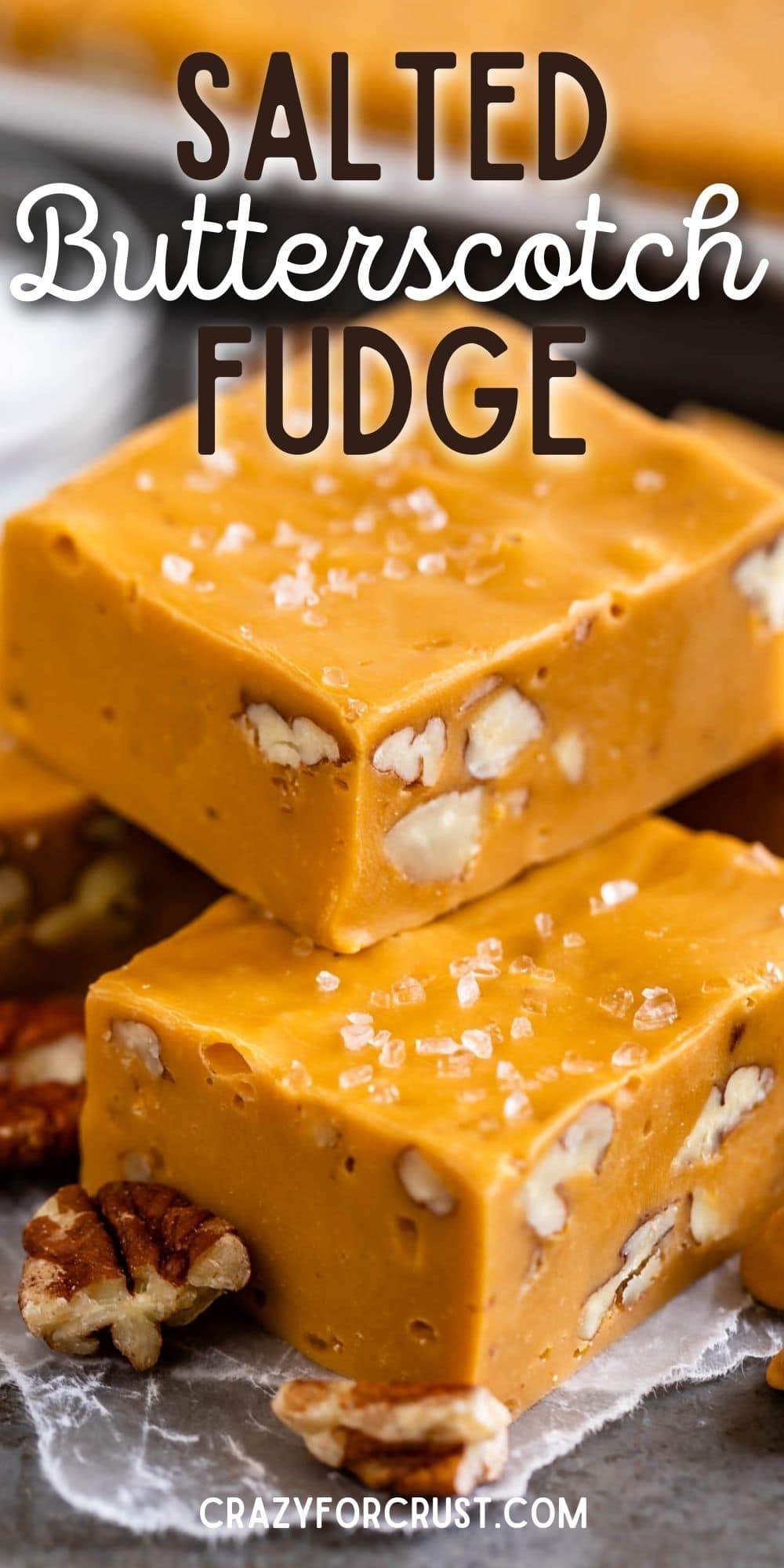 Salted butterscotch fudge stacked on top of eachother with recipe title on top of image