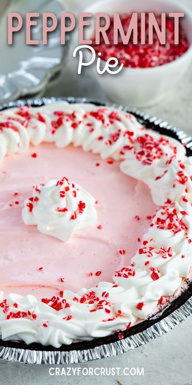 Peppermint pie topped with crushed candy canes and more in the background and recipe title on top of image