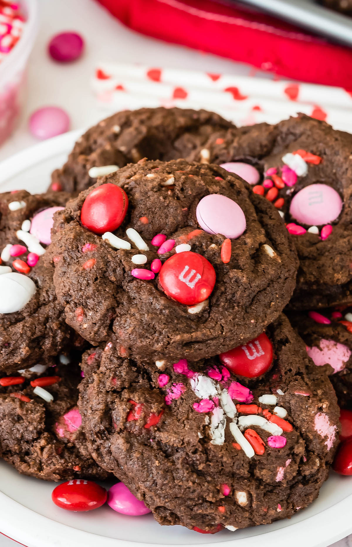 Very Valentine Pudding Cookies stacked on a plate surrounded by valentines decorations