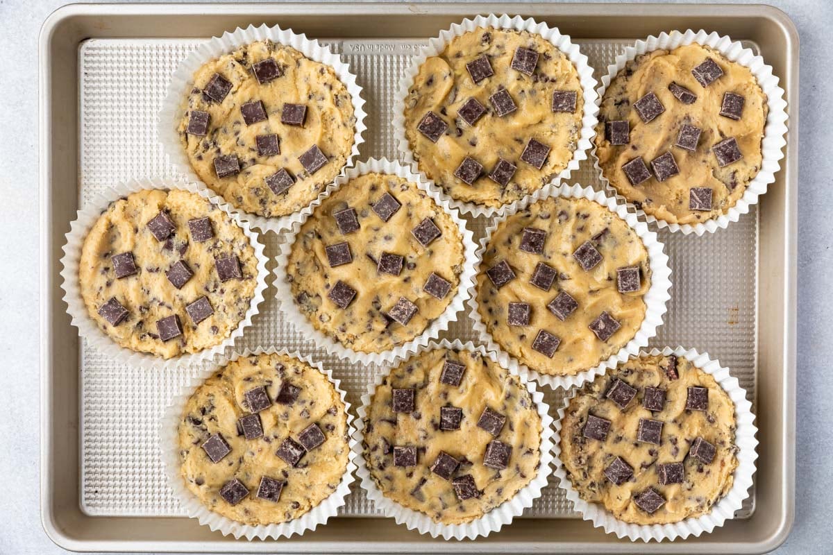 Overhead shot of num num cookie dough in cookie cups before being baked