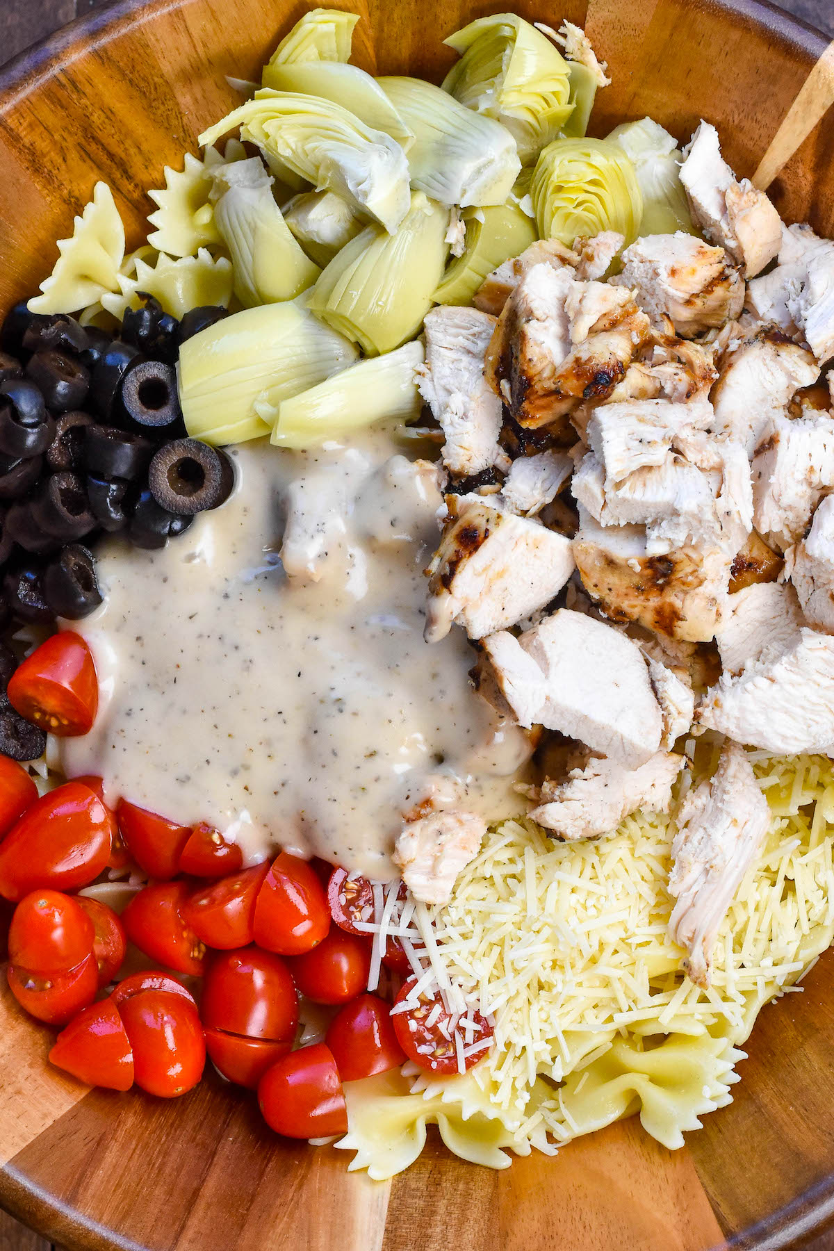 overhead shot of pasta salad ingredients in bowl