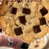 Hand holding one copycat disney num num cookie with recipe title on top of image
