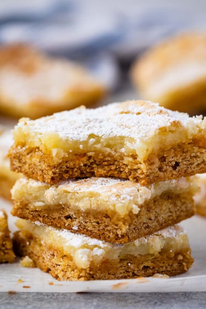 stack of butter cake bars with bite missing