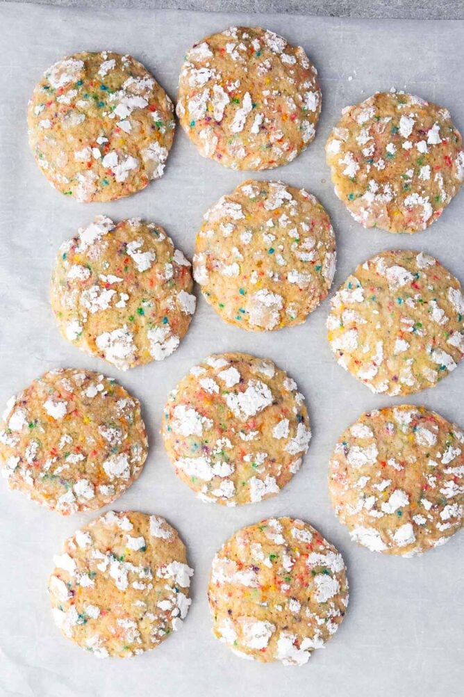 Overhead shot of funfetti crackle cookies on parchment paper
