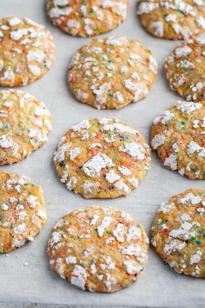 Overhead shot of funfetti crackle cookies on parchment paper